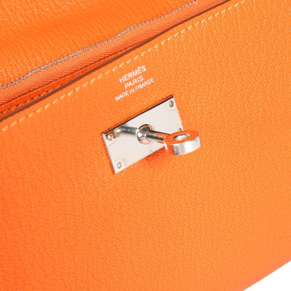 107815 ad2 31a738cd feff 4ac3 b25d 284334d0e660 Hermès Orange Chévre Mysore Kelly Wallet with Palladium Hardware