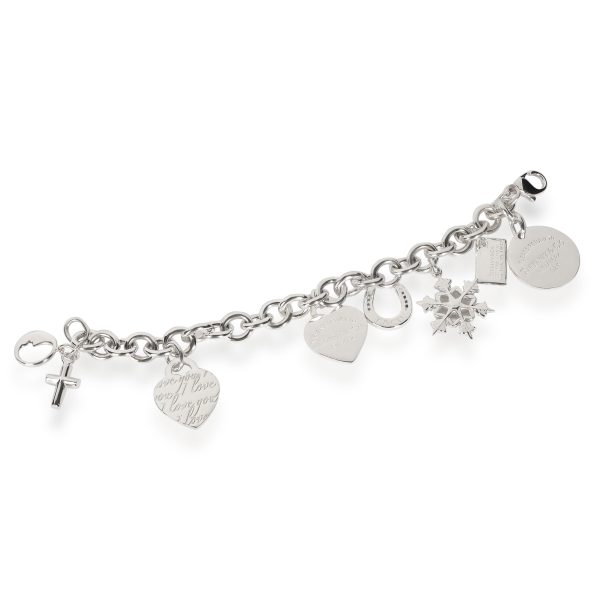 107973 pv Tiffany Co Heart Tag Snowflake Charm Bracelet in Sterling Silver