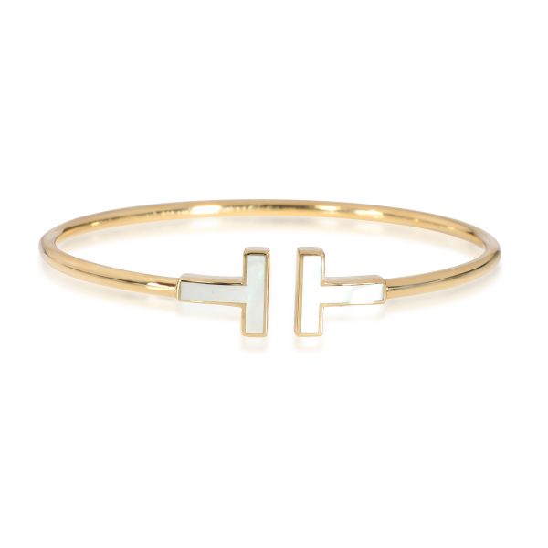 Tiffany Co T Mother Of Pearl Bangle in 18K Yellow Gold Tiffany Co T Mother Of Pearl Bangle in 18K Yellow Gold