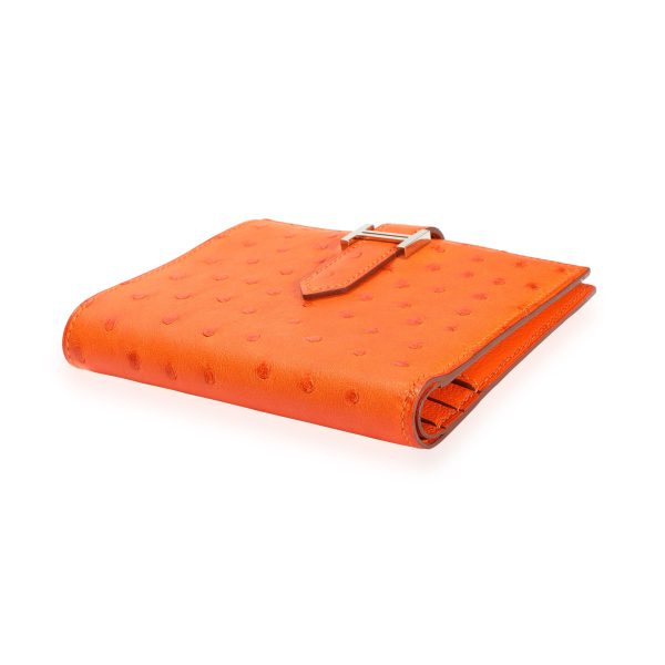 109940 stamp 7a5994c2 ea93 4b8b 8511 4adbc7eebfe6 Hermès Tangerine Ostrich Compact Bearn Wallet PHW