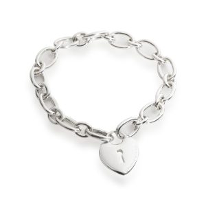 Tiffany Co Heart Lock Charm Bracelet in Sterling Silver Louis Vuitton New Wave New Camera Bag for Snow White