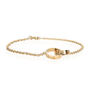 Cartier Love Interlocking Bracelet in 18K Yellow Gold Gucci Sherry Line One Shoulder GG Bag Brown