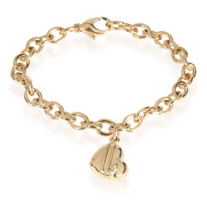 Tiffany Co Cupid Heart Charm Bracelet in 18k Yellow Gold Celine Triomphe Small Bag