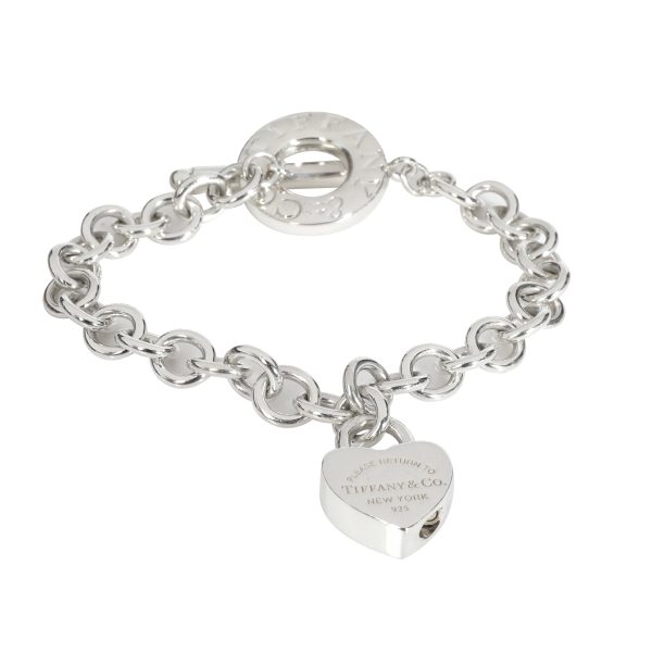 Tiffany Co Toggle Lovelock Charm Bracelet in Sterling Silver Tiffany Co Toggle Lovelock Charm Bracelet in Sterling Silver