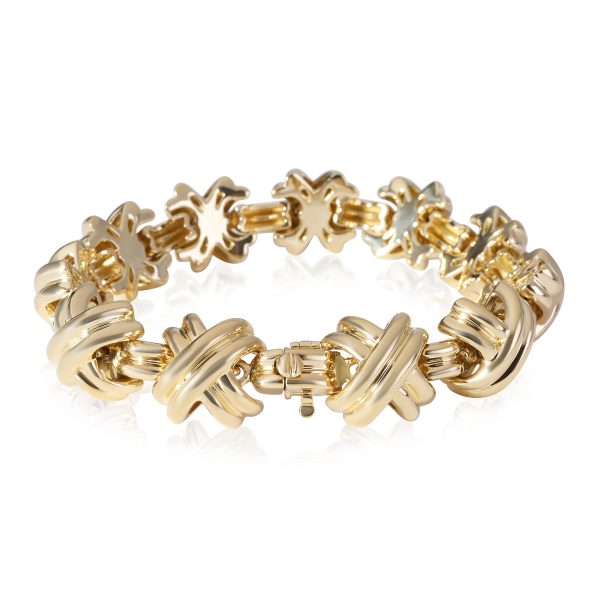 119153 sv e0dd56be 956a 45b2 a3cf 8018da60c4b3 Tiffany Co Vintage Signature X Bracelet in 18k Yellow Gold