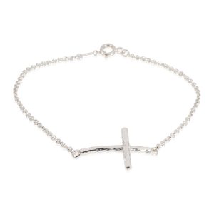 Tiffany Co Paloma Picasso Hammered Cross Bracelet in Sterling Silver Fendi Celeria Peekaboo Regular Handbag