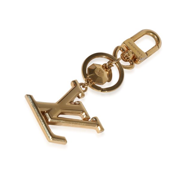 122470 pv 630d1433 acf7 41ba 9d08 6c91c51673d1 Louis Vuitton Gold Metal LV Facettes Bag Charm