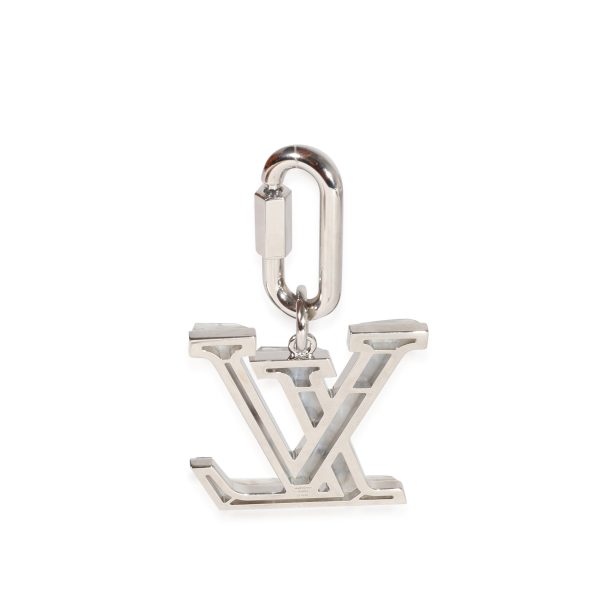 122476 pv 908ebf27 d510 4b5b 9aba de4b806b6f76 Louis Vuitton Marble Resin Silver Metal LV Prism Bag Charm