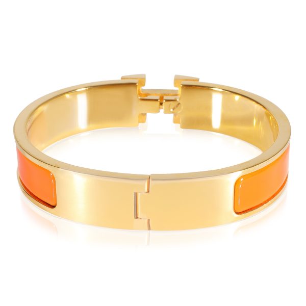 123297 pv 78092fba c54e 45a7 984c 78d4ef9e2999 Hermès Clic H Bracelet in Orange