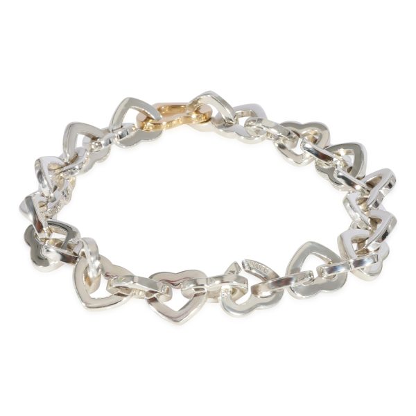 124133 av 0571ded2 8fb8 4c20 a118 f1746748d203 Tiffany Co Heart Link Bracelet in 18k Yellow GoldSterling Silver