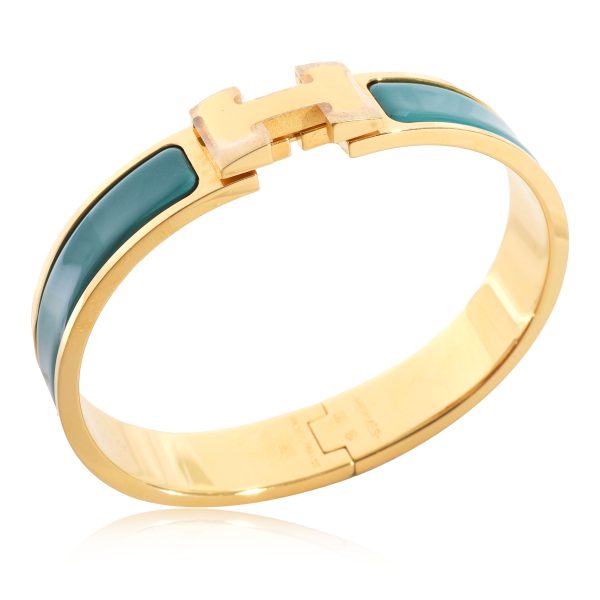 127924 av 2aae5aff 1b24 4125 81ab c3851ee64756 Hermès Turquoise Clic H Bracelet Gold Plated