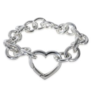 Tiffany Co Heart Clasp Bracelet in Sterling Silver Chanel Cocomark Handbag All Over Pattern Jersey Black Beige