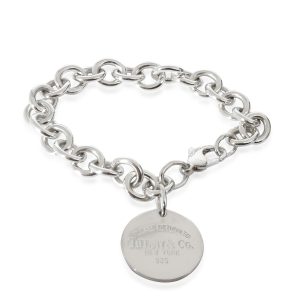 Tiffany Co Return To Tiffany Round Tag Bracelet in Sterling Silver Balenciaga Hourglass XS Metallized Crocodile Embossed Handbag Silver Tone