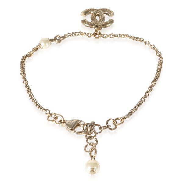 134771 bv c3bfc1e6 315c 486d 999c 531fb2a6e8d3 Gold Plated Chanel 2021 CC Link Bracelet With Faux Pearl Strass Bracelet