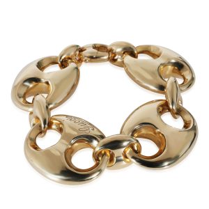 Gucci Puff Link Bracelet in 18k Yellow Gold Maison Margiela Glam Slam Body Bag Black