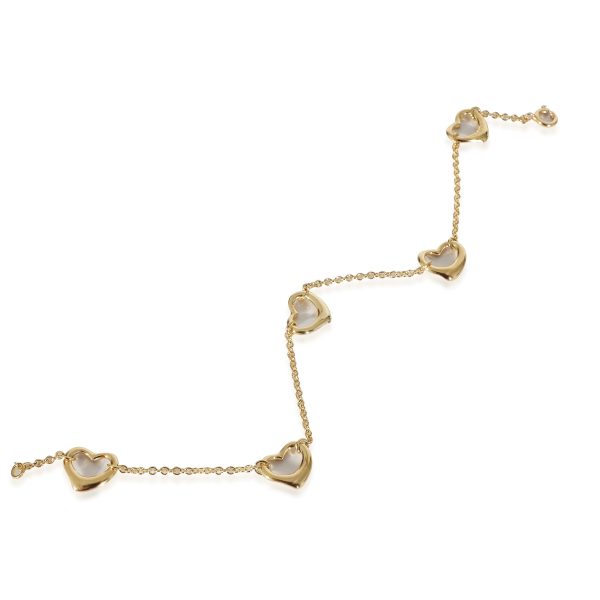 135767 pv be122c73 c647 40eb 99aa e7f7fc04e1e4 Tiffany Co Elsa Peretti Open Heart 5 Station Bracelet in 18K Yellow Gold