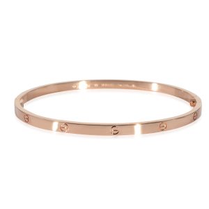 Cartier Love Bracelet in 18K Rose Gold Louis Vuitton Lock Me Taurillon Leather Tote Bag NavyRed