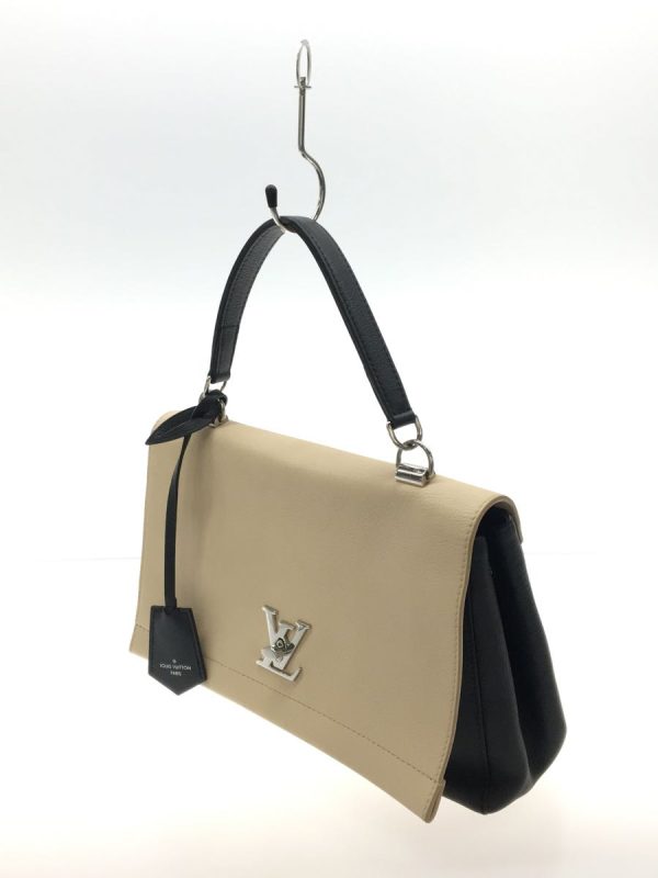 2 Louis Vuitton LockMe Cultable Leather Beige