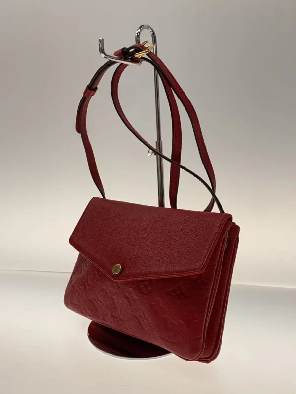 2300038984876 02 LOUIS VUITTON Twice Empreinte Leather Shoulder Bag Red