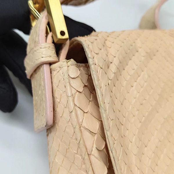 C345F1B1 B02D 4A9F 8595 2E86FAF2A9C8 Fendi baguette nude pink python leather shoulder bag