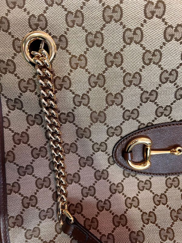 image 5ef8ab92 f4ff 401d ac34 44bf4e60bf59 Gucci 1956 horsebit chain tote in monogram canvas and brown leather