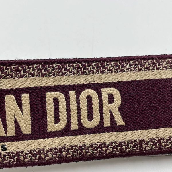 image 73294e5b 752e 49d5 a29a 22cb8aab2357 Dior Saddle Strap maroon canvas with Dior Logo