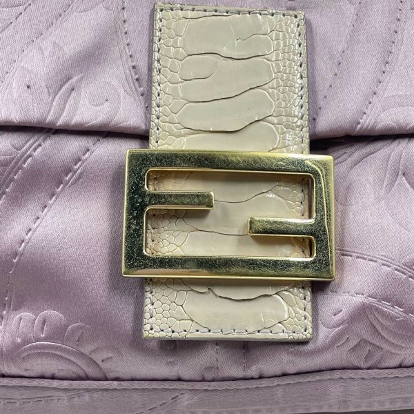 image eb70d164 eca7 422d ab71 5ba33633d0ba FENDI Baguette Purple Silk with embossed pattern