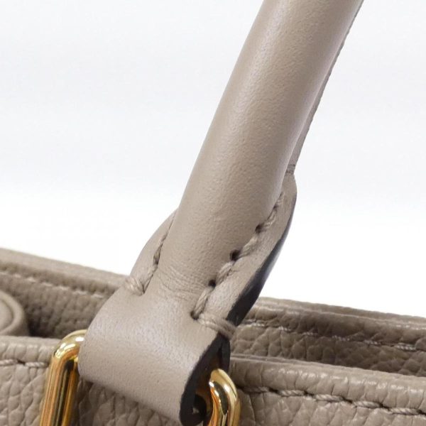 2600038586514 5 b Louis Vuitton Monogram Empreinte On the Go Bag Tourterelle Gold