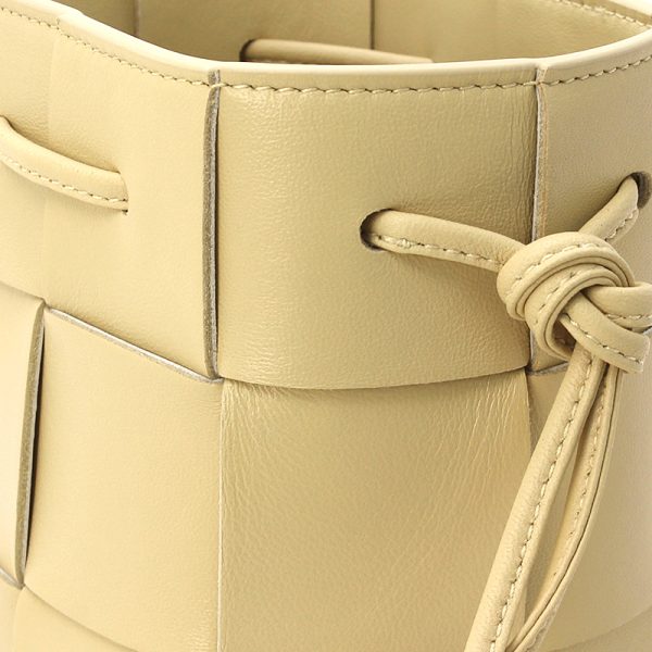 230627 bg6 1 5 BOTTEGA VENETA Mini Bucket Cassette Lambskin Compact Soft Braided Yellow