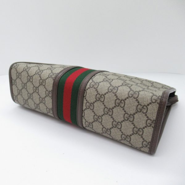 2101217845915 6 Gucci Clutch Bag GG Canvas Brown