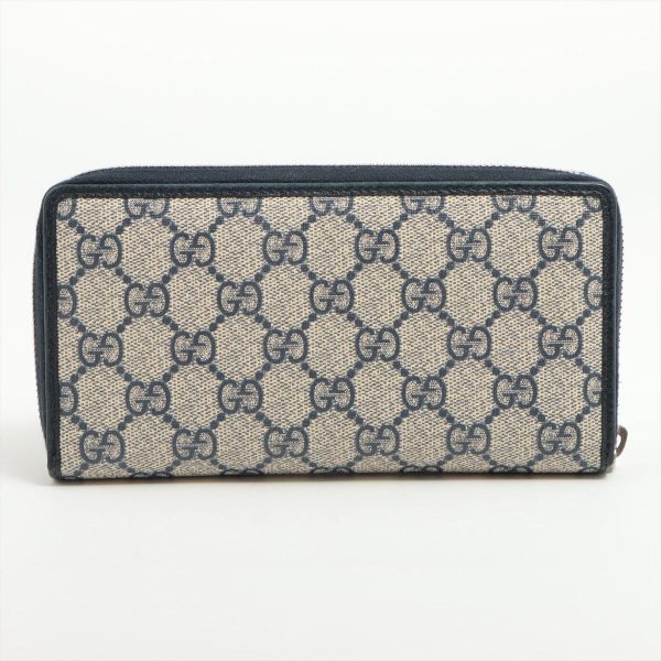 a1922312 1 Gucci GG Supreme Round Zip Wallet Navy