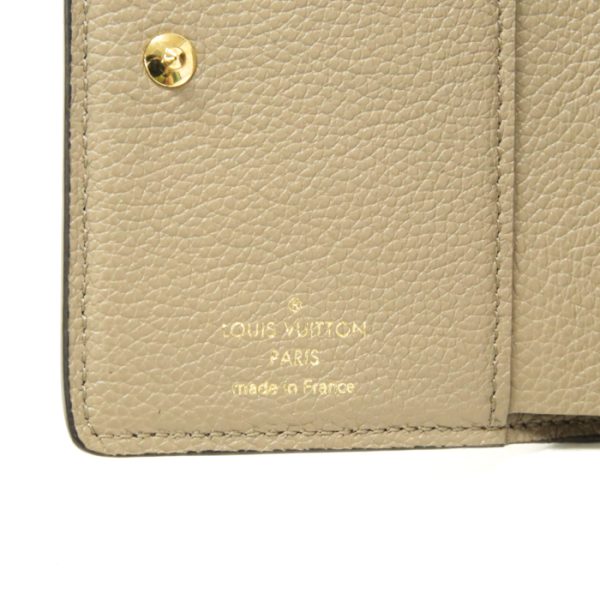 mas20011 6 Louis Vuitton Portefeuil Claire Monogram Empreinte Leather Bifold Wallet Round Zipper Medium Tourtrail Beige