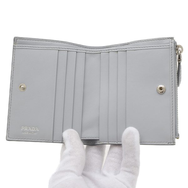 005241224 5 Prada Metal Logo Vitello Dyno Wallet Light Blue