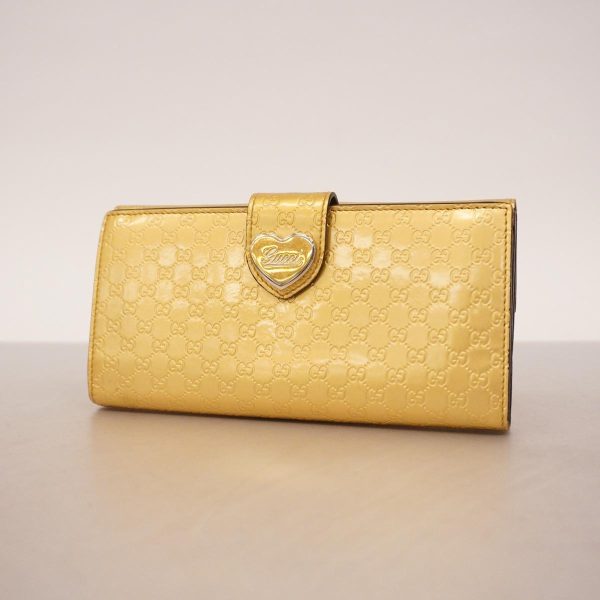 1240001037674 1 Gucci Long Wallet Micro Guccisima Enamel Gold