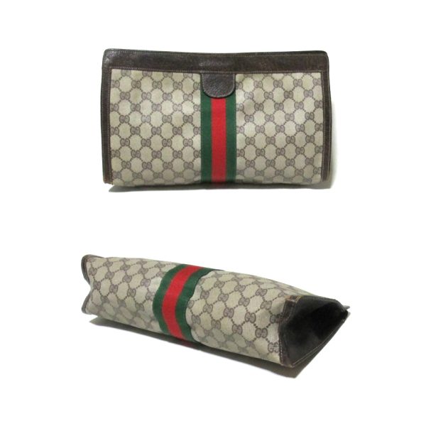 134733 2 Gucci GG Monogram Clutch Bag Wide Size