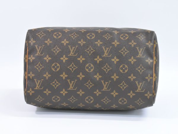 2100020000001307 3 Louis Vuitton Speedy 30 TravelBag Monogram Brown