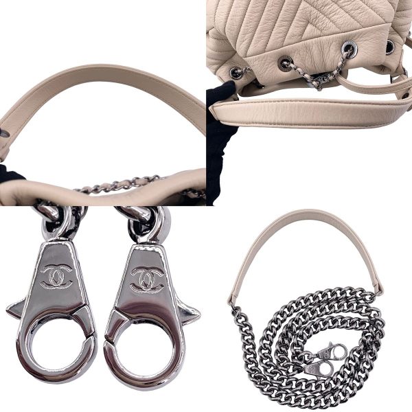 24005395 07 CHANEL Chevron Low String Bag Beige Silver