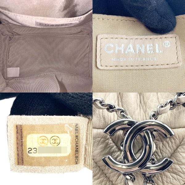 24005395 08 CHANEL Chevron Low String Bag Beige Silver