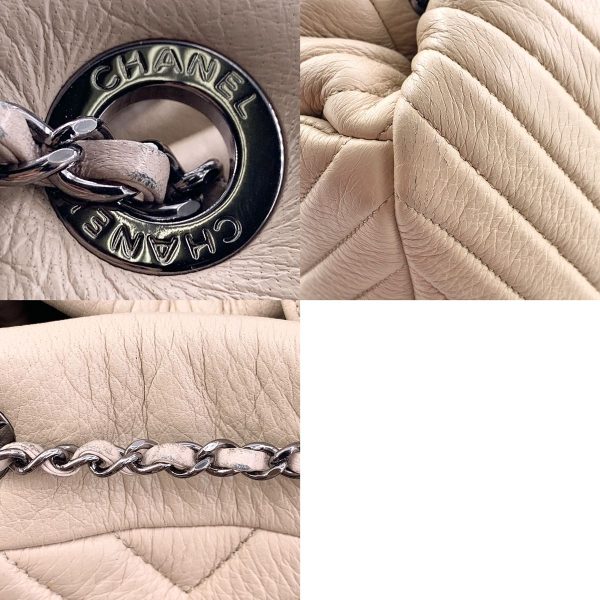 24005395 10 CHANEL Chevron Low String Bag Beige Silver