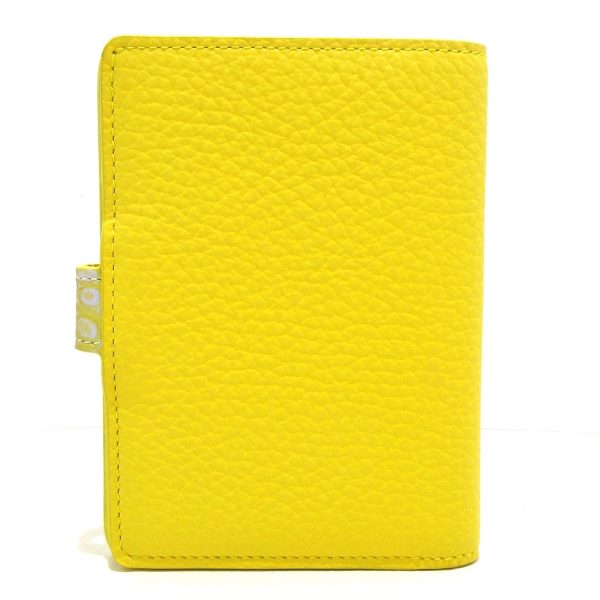 37886872 2 Louis Vuitton LV Vertical Wallet Compact Bifold Wallet Taurillon Yellow