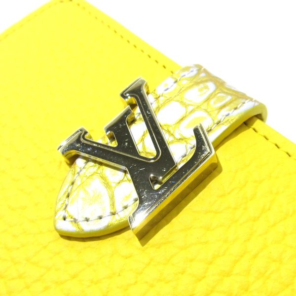 37886872 6 Louis Vuitton LV Vertical Wallet Compact Bifold Wallet Taurillon Yellow