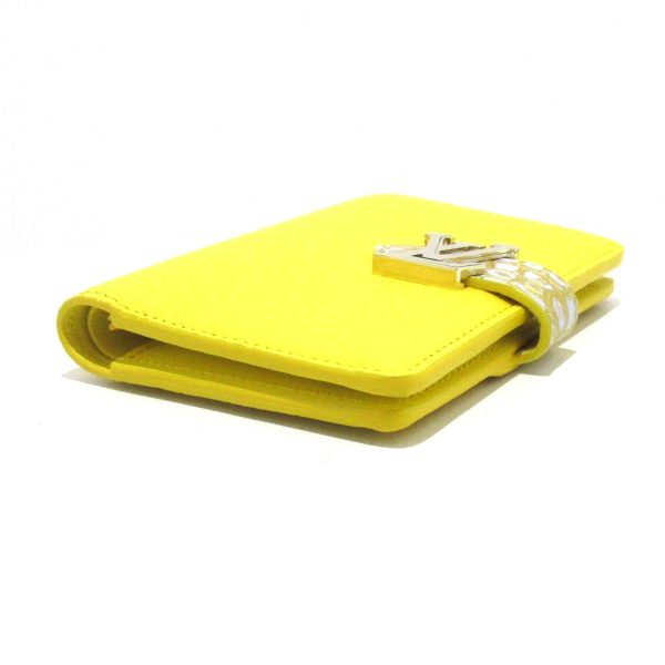 37886872 8 Louis Vuitton LV Vertical Wallet Compact Bifold Wallet Taurillon Yellow