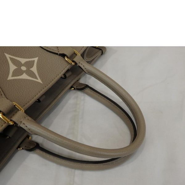 49985 5 Louis Vuitton On the Go MM Turtleneck Handbag Crème