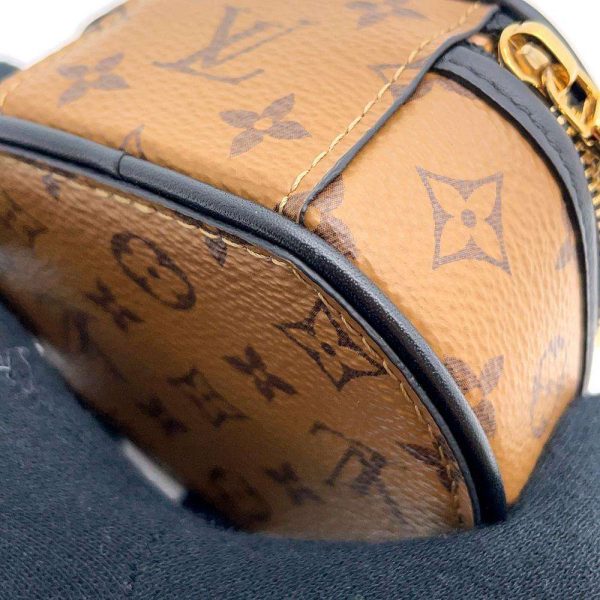 9173897 08 Louis Vuitton Monogram Reverse Boite Chapeau Necklace Mini Bag Brown