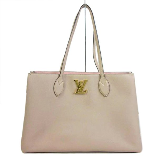 97907 1 Louis Vuitton Lock Me Shopper Greige