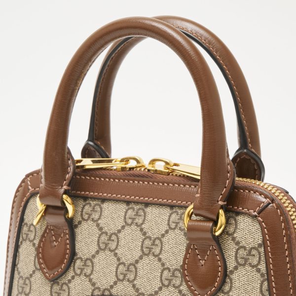 compass1703135834 Gucci Horsebit Supreme Mini Top Handle Bag