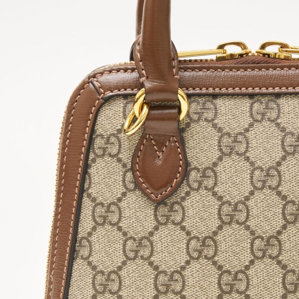 compass1703135897 Gucci Horsebit Supreme Mini Top Handle Bag