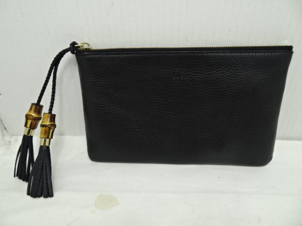 imgrc0088857782 Gucci Bamboo Tassel Clutch Bag in Bamboo Leather