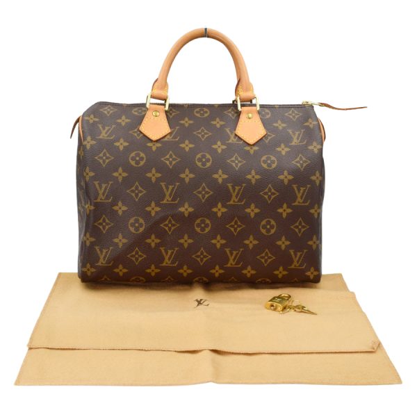 imgrc0175764276 Louis Vuitton Speedy 30 Monogram Handbag Brown