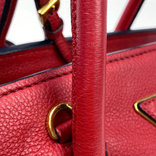 1000058735823 16 Prada Logo Plate Leather Handbag Red